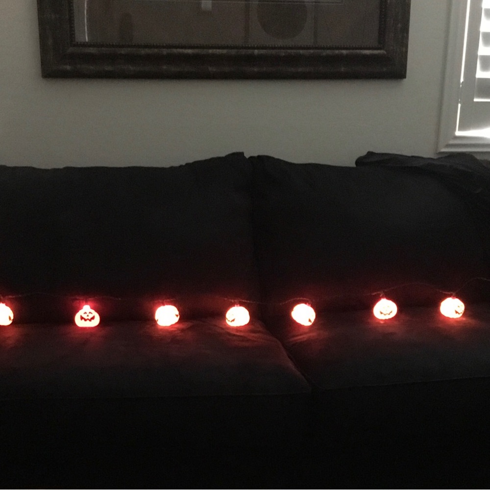 Halloween stein lights.  Plastic  9’ long . 10 pumpkin lights on string.